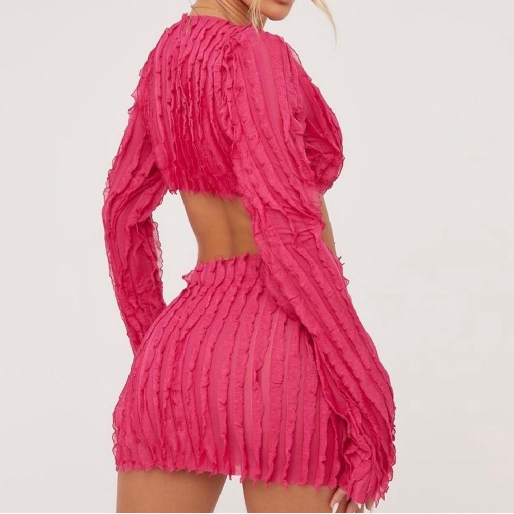 Long sleeve plunge neck cut out mini dress